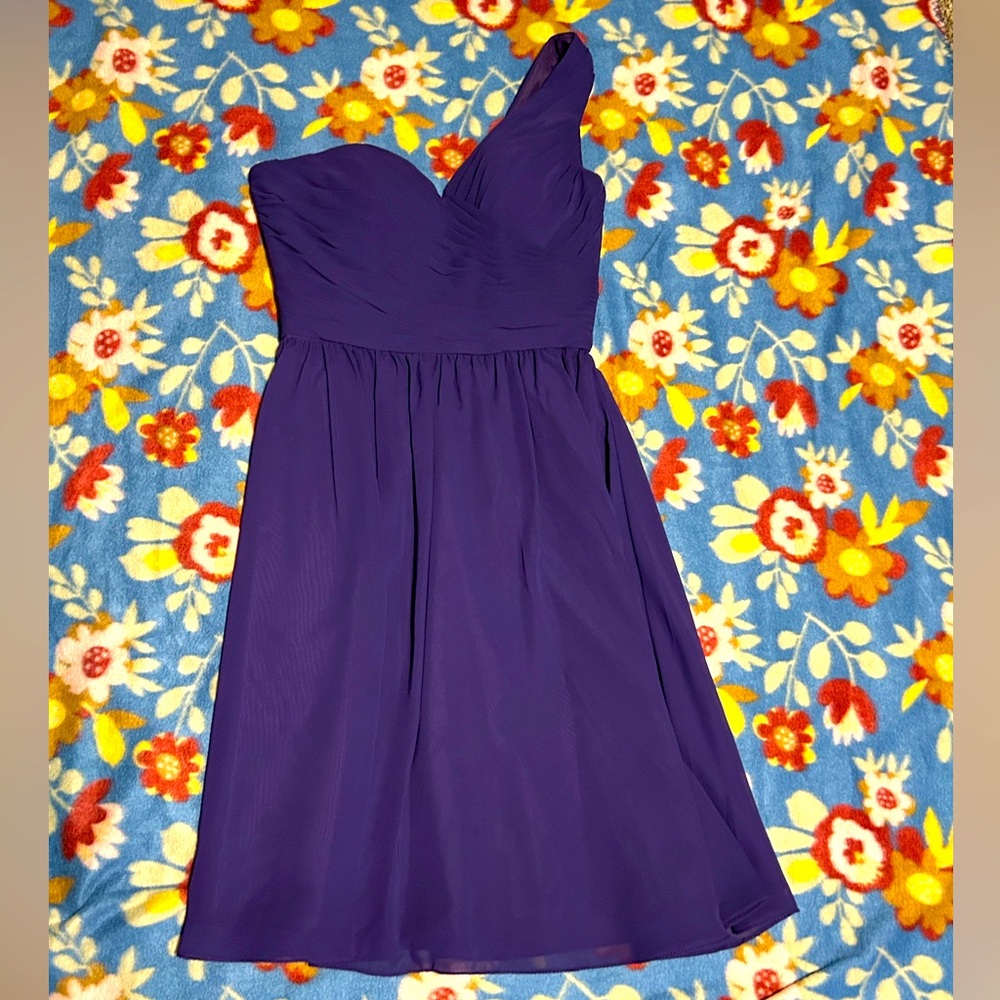 Stunning on. Women’s eggplant color, one shoulder dress. Size 4.